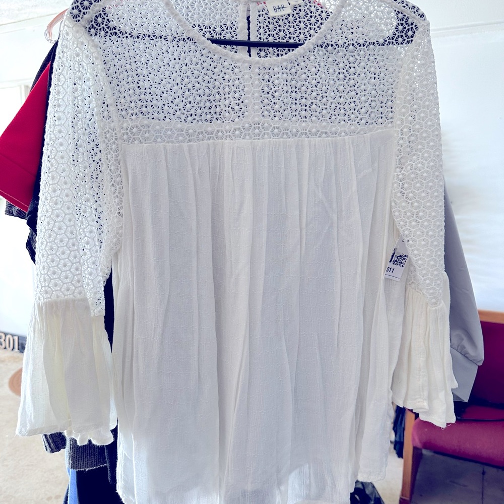 Lace white shirt with one button closure